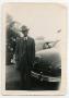 Photograph: [Photograph of Jim Clark in Front of Car]