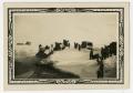 Photograph: [Caravan of Tanks Moving From Pond]