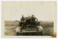 Photograph: [Two Men on Tank]