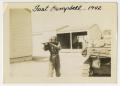 Photograph: [Man Aiming Firearm at Fort Campbell]