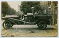 Postcard: [Postcard with a Photo of a Fire Truck at a Fire Station]