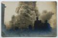 Postcard: [Postcard with a Photo of a Large Building on Fire]