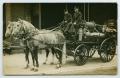 Postcard: [Postcard with a Photograph of a Horse-Drawn Fire Wagon]