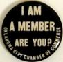 Thumbnail image of item number 1 in: '[Button that reads: "I AM A MEMBER ARE YOU? OKLAHOMA CITY CHAMBER OF COMMERCE"]'.