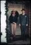 Photograph: [Watt Matthews and Ardon Judd, Sr. in a Decorated Doorway]