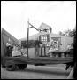 Photograph: [Parade Float Representing a School House]