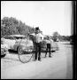Thumbnail image of item number 1 in: '[Man and Boy with Penny-Farthing Bicycles]'.
