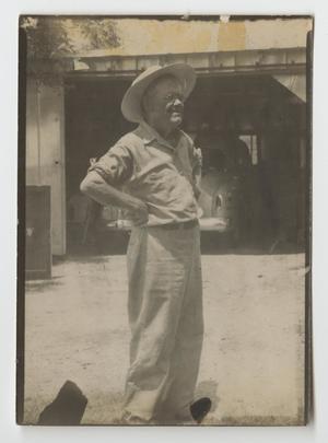 Primary view of object titled '[Photograph of W. D. McCoy Outside a Garage]'.