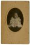 Photograph: [Portrait of a Small Baby in a Dress]
