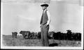 Photograph: [Photograph of Albert Peyton George standing in a pasture]