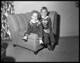 Photograph: [Two Small Boys on Chair]