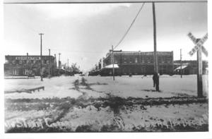 Primary view of object titled '[3rd Street, Rosenberg, after ice storm. "Main Street" written on photo.]'.