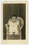 Postcard: [Portrait of Small Child Sitting in a Chair]