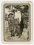 Photograph: [Photograph of a Man and Boy]