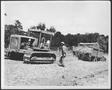 Thumbnail image of item number 1 in: '[Photograph of a  Caterpillar bulldozer and truck at work]'.