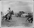 Primary view of [Photograph of Matlock Rose riding the quarter horse Buster Waggoner owned by Lester Goodson]