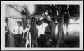 Photograph: [Photograph of four men posed next to trussed deer killed during a hu…