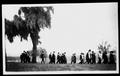 Primary view of [Group of men walking at the George Camp cookout]