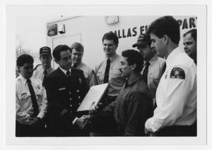 Primary view of object titled '[Civilian receives lifesaving award]'.