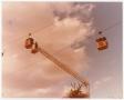 Photograph: [Aerial Lift Crane Used to Reach Sky Tram Car]
