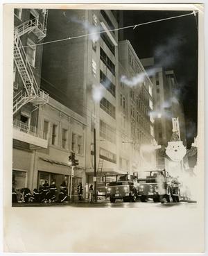 Primary view of object titled '[Street View of Burning Neiman-Marcus]'.
