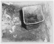 Photograph: [Burned Bin Sitting in Ash and Rubble]