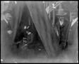 Thumbnail image of item number 1 in: '[Albert Peyton George and two other men outside of a tent, a woman sitting in the tent]'.