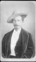 Thumbnail image of item number 1 in: '[Albert Lamar George, seated and wearing a dark three piece suit and a hat]'.