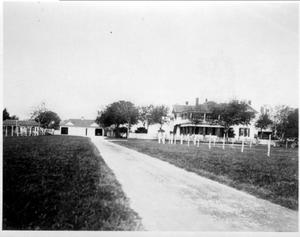 Primary view of object titled '[The dirt driveway leading to the George house]'.