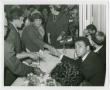 Photograph: [Muhammed Ali Shakes Hands with a Woman]