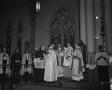 Photograph: [Men at Pontifical Mass at the Seton Hospital 50th Anniversary]