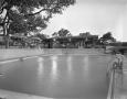 Photograph: [Exterior View of the Terrace Motor Hotel Pool]