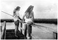 Primary view of [Mary Jones Prowell and Virginia Davis Scarborough fishing on a dock]