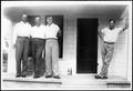 Thumbnail image of item number 1 in: '[Photograph of four young men standing on the front porch of a house]'.