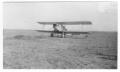 Photograph: [Airplane in Field]