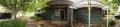 Photograph: Panoramic image of the front door of an O'Neil Ford home in Denton, T…