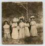 Photograph: [Photograph of a Group of Women and Two Men]