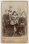 Photograph: [Photograph of Three Children and a Woman]
