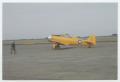 Photograph: [Brown in Plane on Runway]