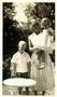 Thumbnail image of item number 1 in: '[Barbara McCampbell and her two children in a yard]'.